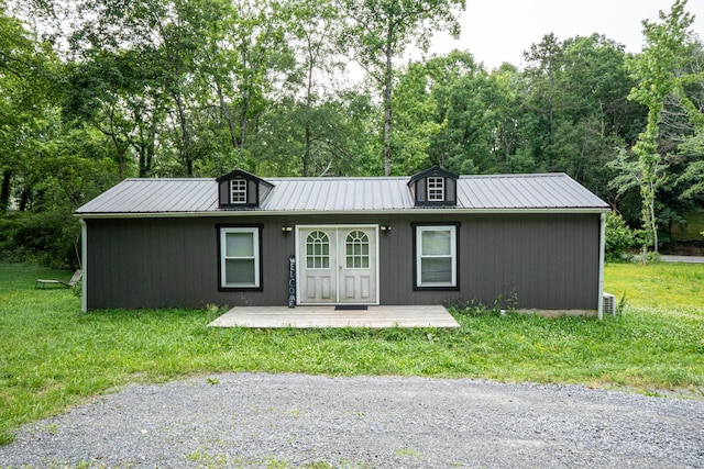 9465 N Hickory Valley Rd, Chattanooga, TN 37416 - ranch-style home with metal roof and a front yard
