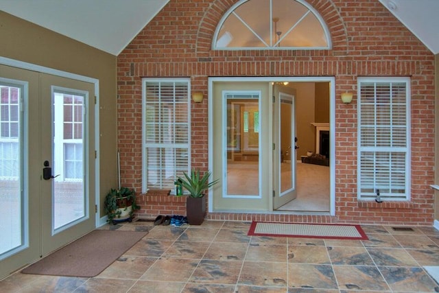 entrance to property featuring a patio