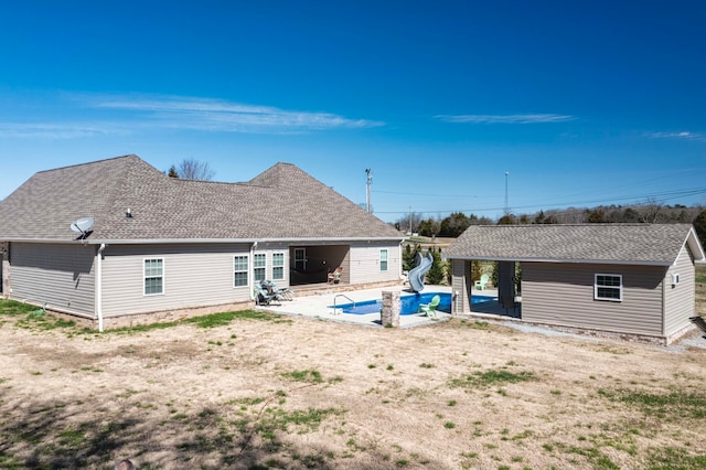 rear view of house featuring a patio