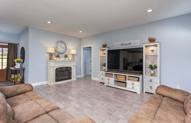 living room with light hardwood / wood-style flooring