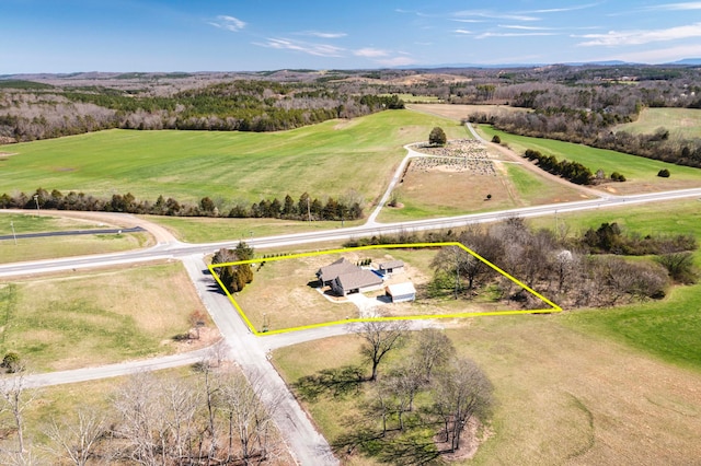 birds eye view of property featuring a rural view