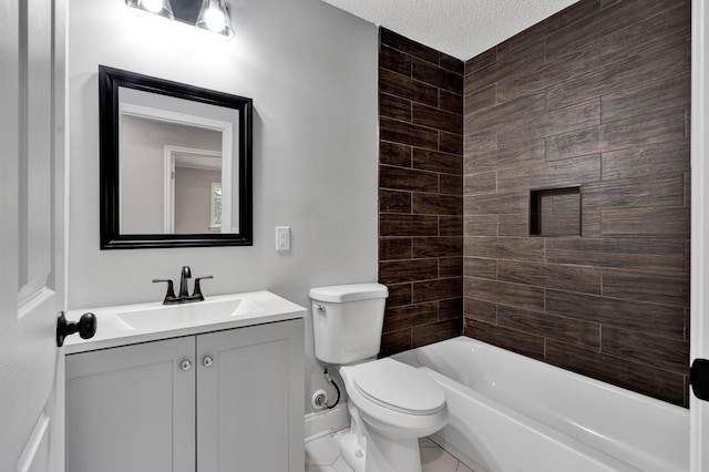 full bathroom with tile patterned floors, vanity, a textured ceiling, toilet, and tiled shower / bath