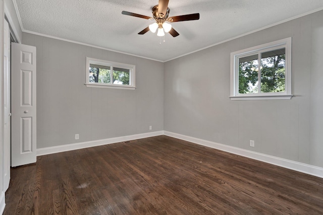 unfurnished room with a textured ceiling, ceiling fan, crown molding, and dark hardwood / wood-style floors