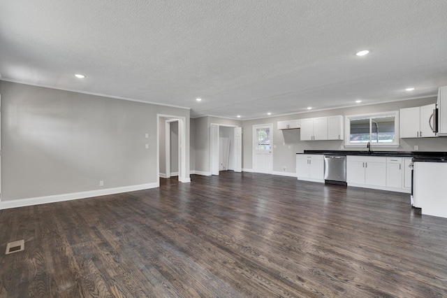 kitchen featuring white cabinets, dishwasher, plenty of natural light, and dark wood-type flooring