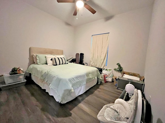 bedroom featuring ceiling fan and wood finished floors