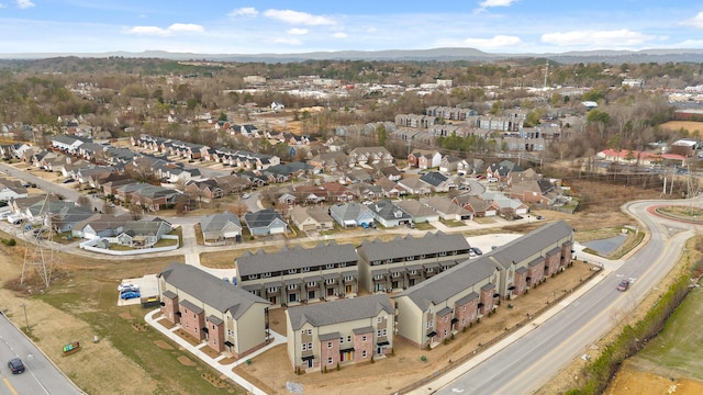 drone / aerial view with a residential view and a mountain view