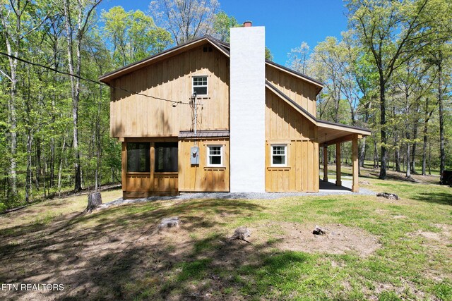355 Cross Keys Ln, Ten Mile, TN 37880 - rear view of property featuring a chimney and a yard