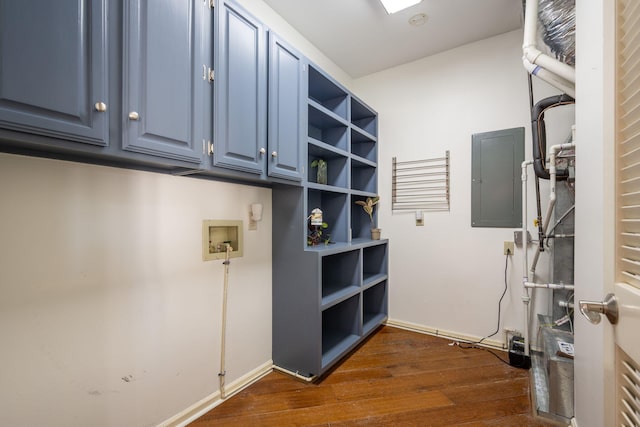 laundry area featuring cabinets, dark wood-type flooring, hookup for a washing machine, and electric panel