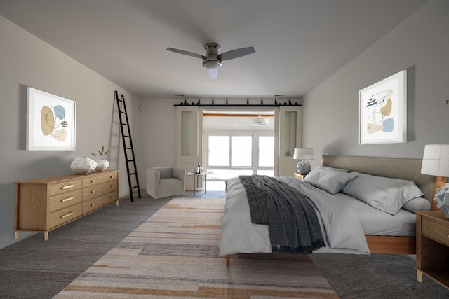 bedroom featuring ceiling fan and carpet flooring