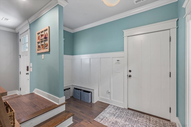 entryway featuring crown molding and dark hardwood / wood-style floors