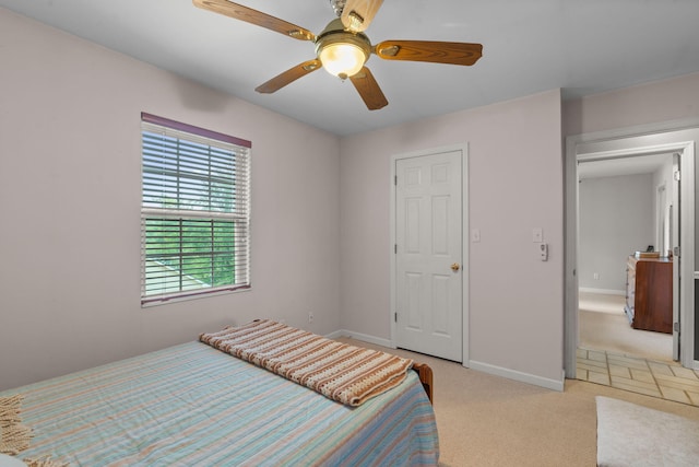 681 Pinhook Rd, Calhoun, TN 37309 - bedroom with light carpet, baseboards, and ceiling fan