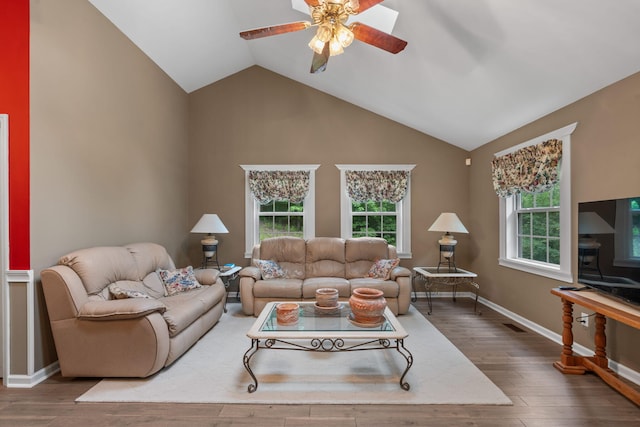 681 Pinhook Rd, Calhoun, TN 37309 - living area with a ceiling fan, wood finished floors, high vaulted ceiling, and baseboards