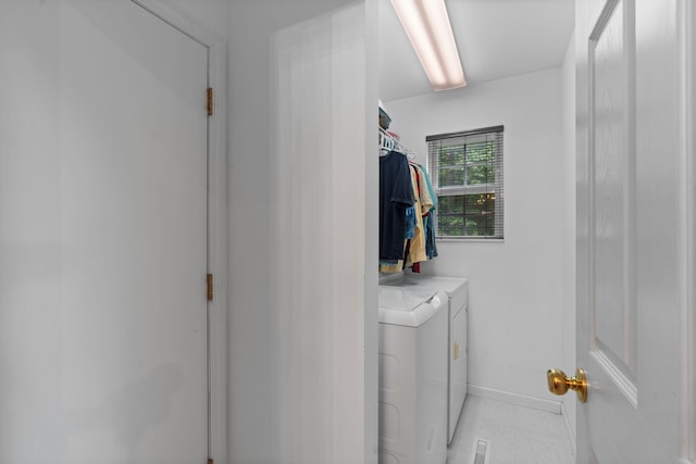 681 Pinhook Rd, Calhoun, TN 37309 - laundry area with separate washer and dryer and baseboards