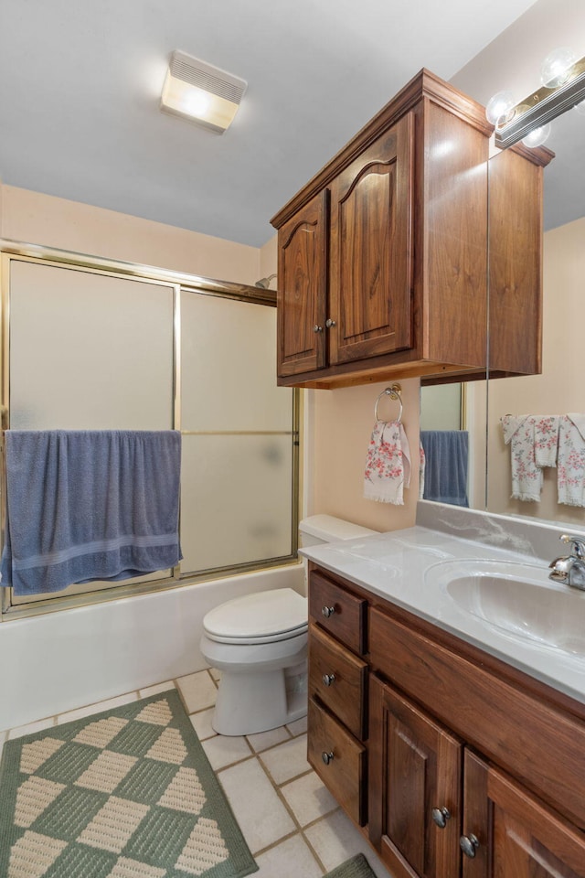 681 Pinhook Rd, Calhoun, TN 37309 - bathroom with vanity, bath / shower combo with glass door, and toilet