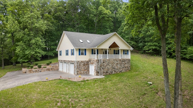 681 Pinhook Rd, Calhoun, TN 37309 - single story home with stone siding, driveway, a porch, a front yard, and a garage