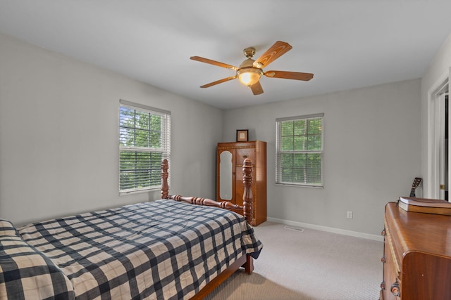 681 Pinhook Rd, Calhoun, TN 37309 - bedroom featuring multiple windows, carpet floors, baseboards, and a ceiling fan