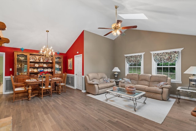 681 Pinhook Rd, Calhoun, TN 37309 - living room featuring high vaulted ceiling, a chandelier, wood finished floors, ceiling fan, and a skylight