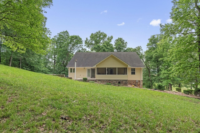 681 Pinhook Rd, Calhoun, TN 37309 - ranch-style home with a front lawn and a sunroom