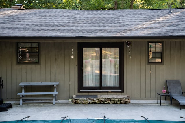 entrance to property with a patio area