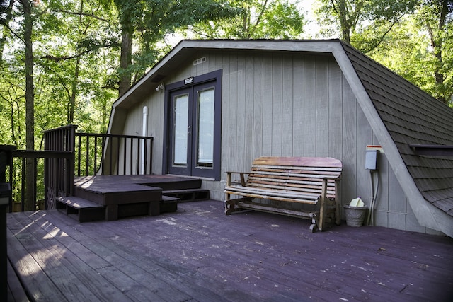 wooden deck featuring french doors