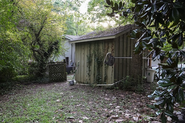 view of outbuilding featuring central air condition unit