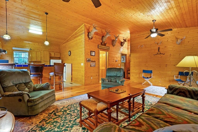 865 Ewing Rd, Spring City, TN 37381 - living area with a ceiling fan, wood finished floors, high vaulted ceiling, wooden ceiling, and wood walls