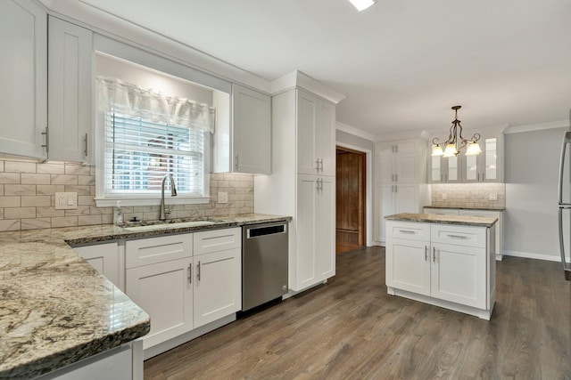 kitchen featuring dishwasher, sink, an inviting chandelier, pendant lighting, and white cabinets