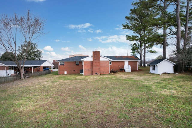 view of yard with a storage unit