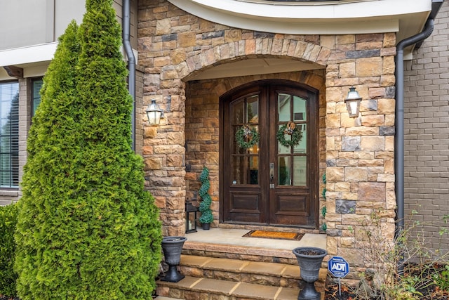 entrance to property featuring french doors