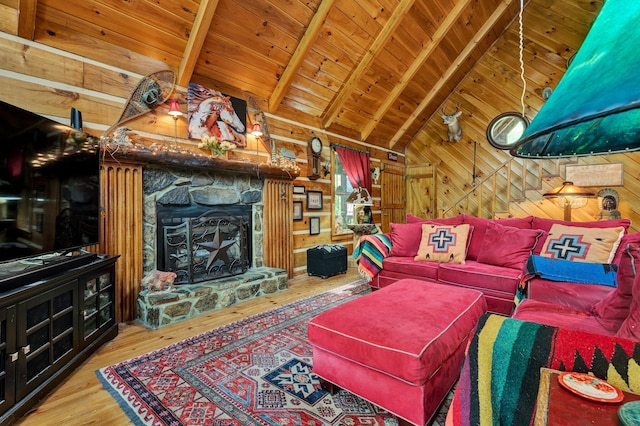 362 River Run Rd, Calhoun, TN 37309 - living room with wooden walls, wooden ceiling, beamed ceiling, wood finished floors, and a stone fireplace