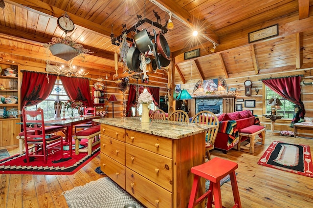 362 River Run Rd, Calhoun, TN 37309 - kitchen featuring wooden ceiling, wood-type flooring, a chandelier, wood walls, and a center island