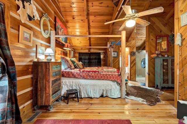 362 River Run Rd, Calhoun, TN 37309 - bedroom featuring wooden walls, wooden ceiling, and wood-type flooring