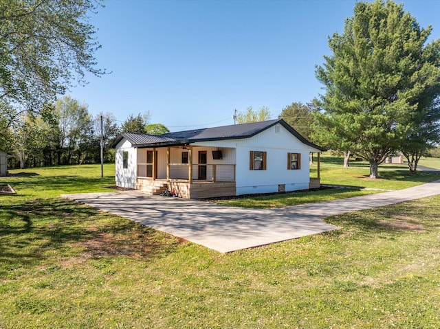 exterior space featuring crawl space, covered porch, and a front yard