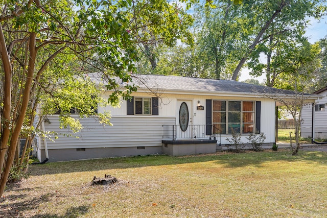 view of front of property with a front lawn