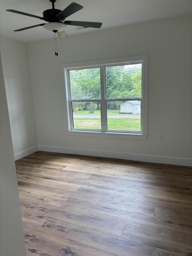 2901 Bobo Ave NW, Cleveland, TN 37312 - spare room with wood finished floors and ceiling fan