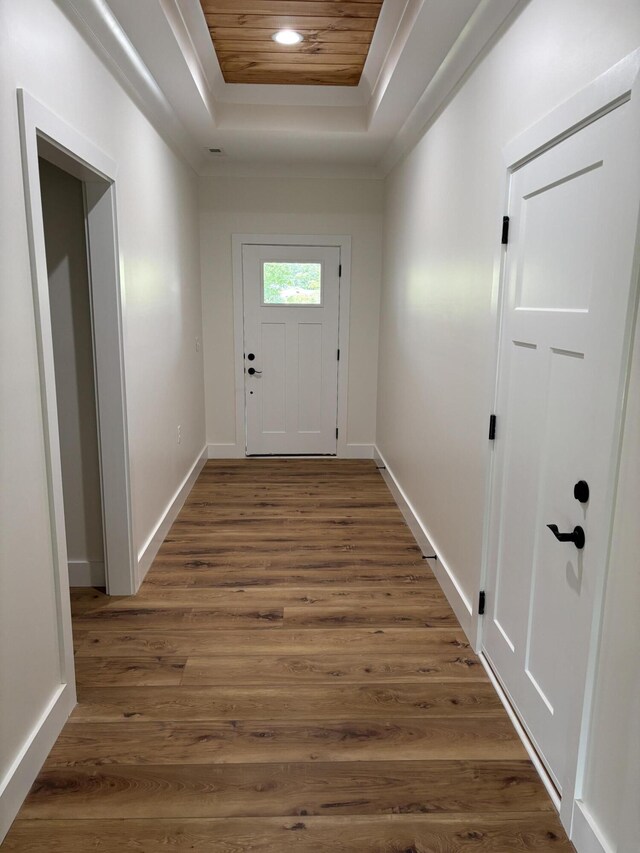 2901 Bobo Ave NW, Cleveland, TN 37312 - entryway featuring a tray ceiling, wood finished floors, and crown molding