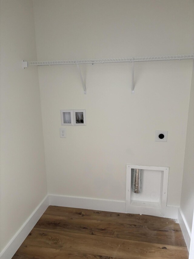 2901 Bobo Ave NW, Cleveland, TN 37312 - laundry room with hookup for an electric dryer, wood finished floors, and hookup for a washing machine