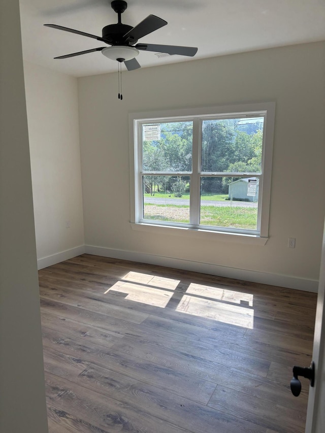 2901 Bobo Ave NW, Cleveland, TN 37312 - unfurnished room with wood finished floors and ceiling fan