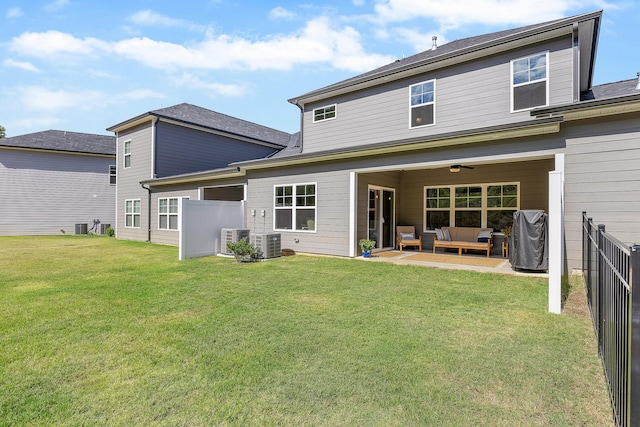 back of house featuring a lawn, outdoor lounge area, ceiling fan, and central air condition unit