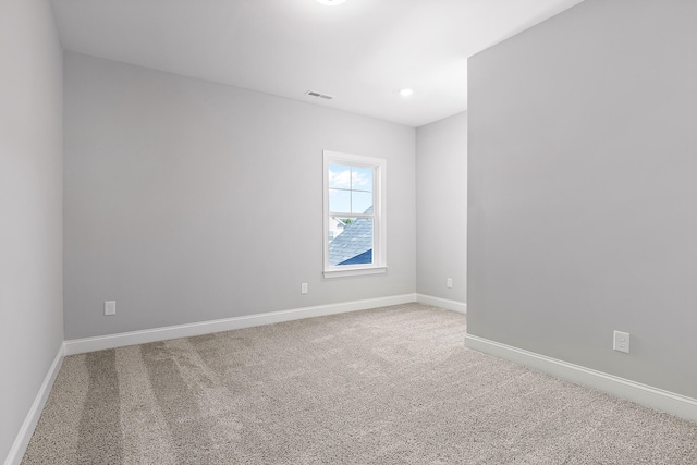 empty room with carpet floors