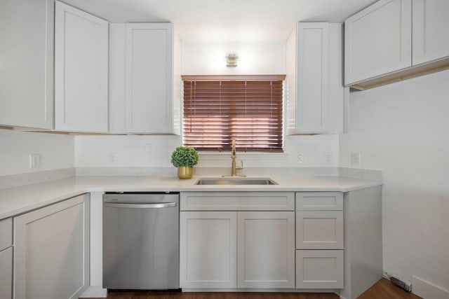 kitchen featuring sink, white cabinetry, and stainless steel dishwasher