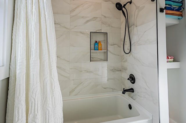 bathroom featuring shower / bath combination with curtain