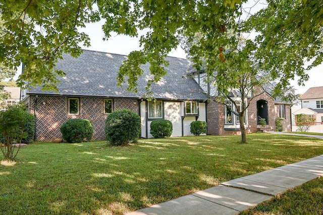 view of front of home with a front yard