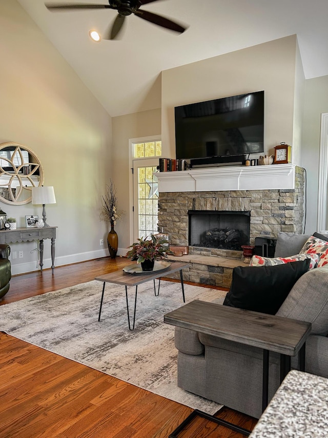 5755 Frontage Rd NW, Cleveland, TN 37312 - living area with a ceiling fan, a fireplace, baseboards, wood finished floors, and high vaulted ceiling