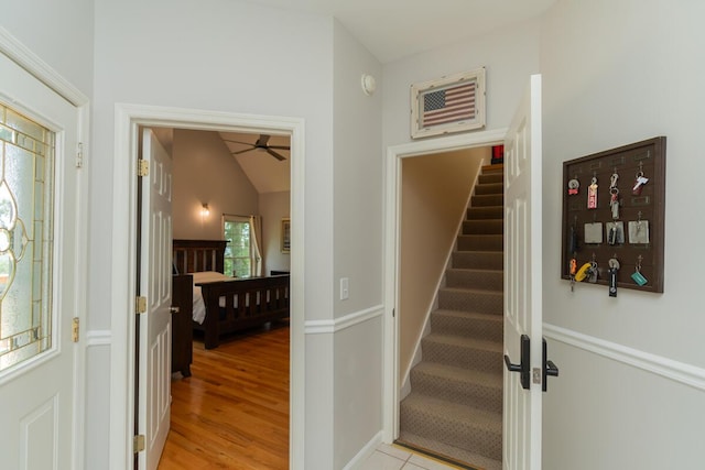 328 Mill Hamlet Rd NW, Charleston, TN 37310 - entryway featuring stairs, a ceiling fan, vaulted ceiling, and light wood-type flooring