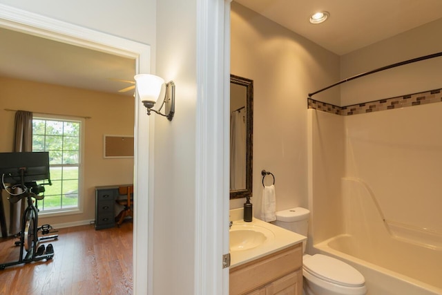 328 Mill Hamlet Rd NW, Charleston, TN 37310 - full bathroom featuring toilet, vanity, wood finished floors,  shower combination, and recessed lighting