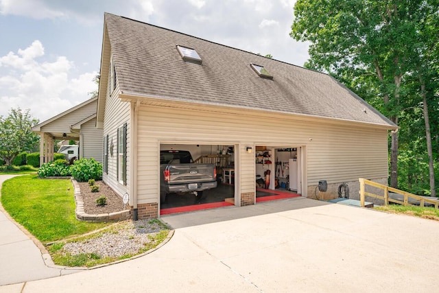 328 Mill Hamlet Rd NW, Charleston, TN 37310 - view of home's exterior featuring a garage, driveway, and roof with shingles