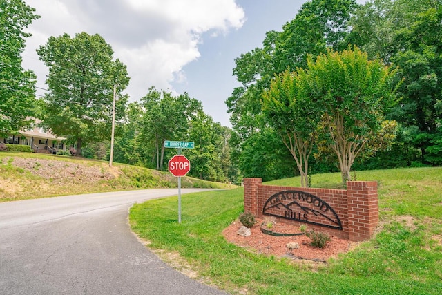 328 Mill Hamlet Rd NW, Charleston, TN 37310 - community sign with a yard and asphalt driveway