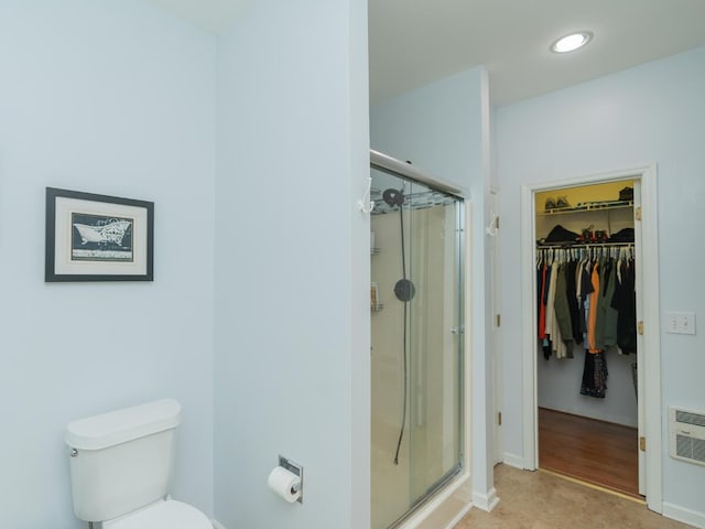 328 Mill Hamlet Rd NW, Charleston, TN 37310 - bathroom featuring a stall shower, a walk in closet, toilet, baseboards, and recessed lighting