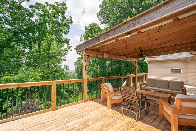 328 Mill Hamlet Rd NW, Charleston, TN 37310 - wooden deck featuring an outdoor living space and a ceiling fan